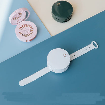 Maroon Asteria portable wrist fan with mirror, leafless design, USB rechargeable, three-speed settings for personal cooling.
