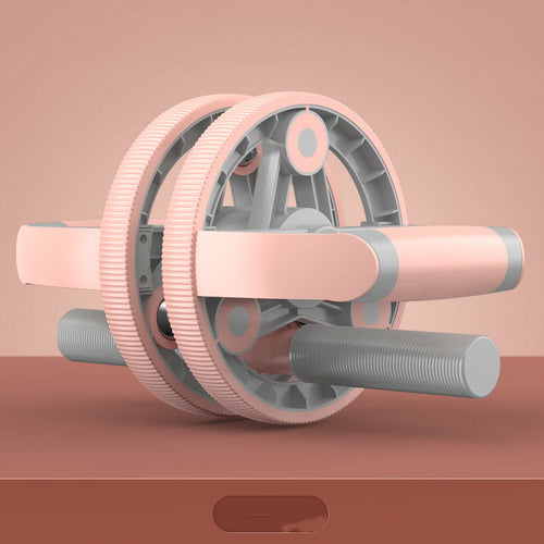 Maroon Asteria multifunctional abdominal muscle wheel for home gym, showing the compact fitness equipment in use.