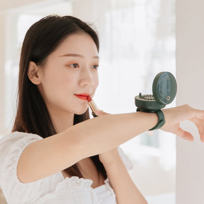 Maroon Asteria portable wrist fan with mirror, leafless design, USB rechargeable, and 3-speed settings for home improvement use