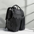 Carmine Juneberry SmartMom Travel+ diaper backpack with multiple compartments and padded shoulder straps for moms on the go.