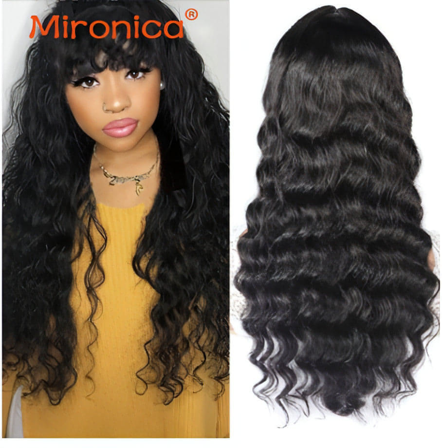 Carmine Juneberry TrueTress Loose Wave human hair wig with soft, flowing loose waves and natural shine on a mannequin head.