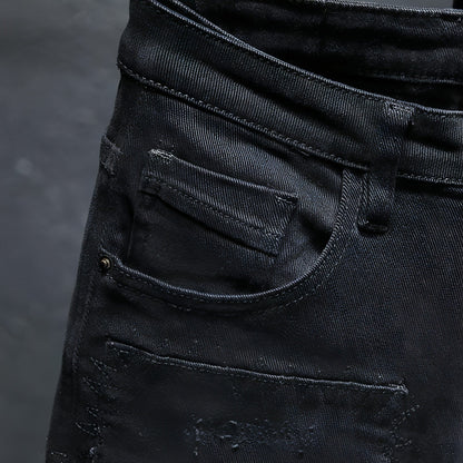 Carmine Juneberry DenimDare™ Pure Black ripped stretch jeans for men, black denim pants with distressed details.