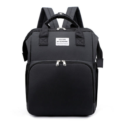 Carmine Juneberry ALLFASHION™ FoldAway BabyNest Backpack with adjustable straps and compact design for convenient carrying