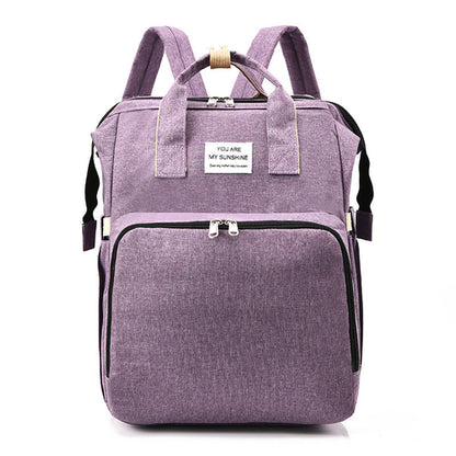 Carmine Juneberry ALLFASHION™ FoldAway BabyNest Backpack with adjustable straps and compact foldable design.