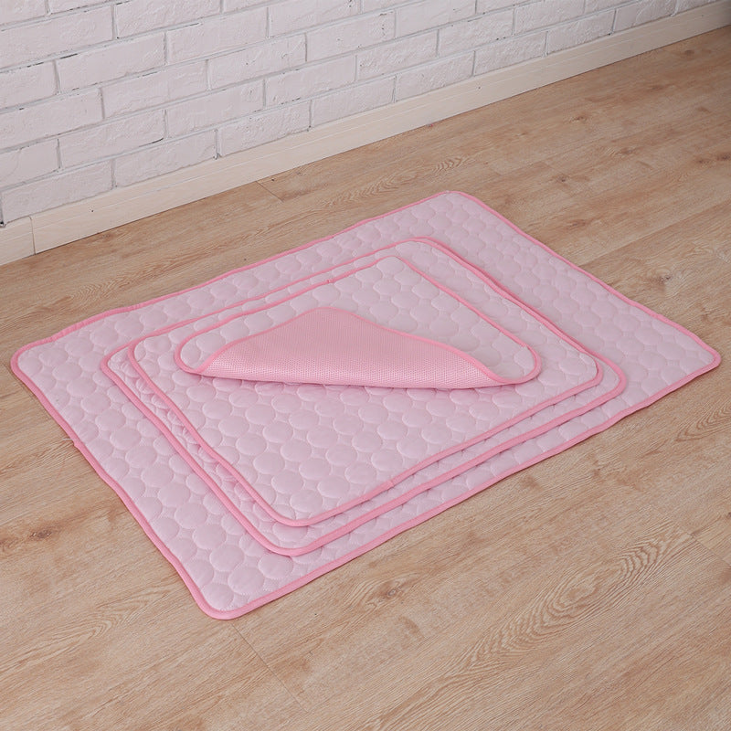 Maroon Asteria pet summer portable ice silk cooling pad on a bed, designed to keep pets cool and comfortable during hot weather.
