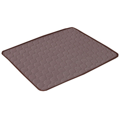 Maroon Asteria pet summer portable ice silk cooling pad on a soft bed, ideal for keeping pets cool during hot weather.