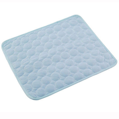 Maroon Asteria pet summer portable ice silk cooling pad on a soft bed, designed to keep pets cool and comfortable during hot days.