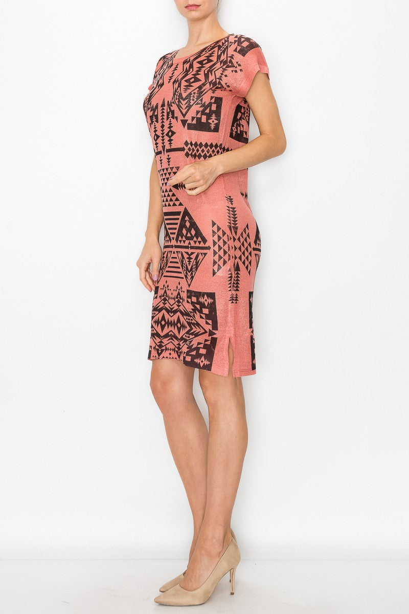 Yellow Hera short sleeve Aztec print dress in coral with a flowy design and vibrant pattern, perfect for warm weather.