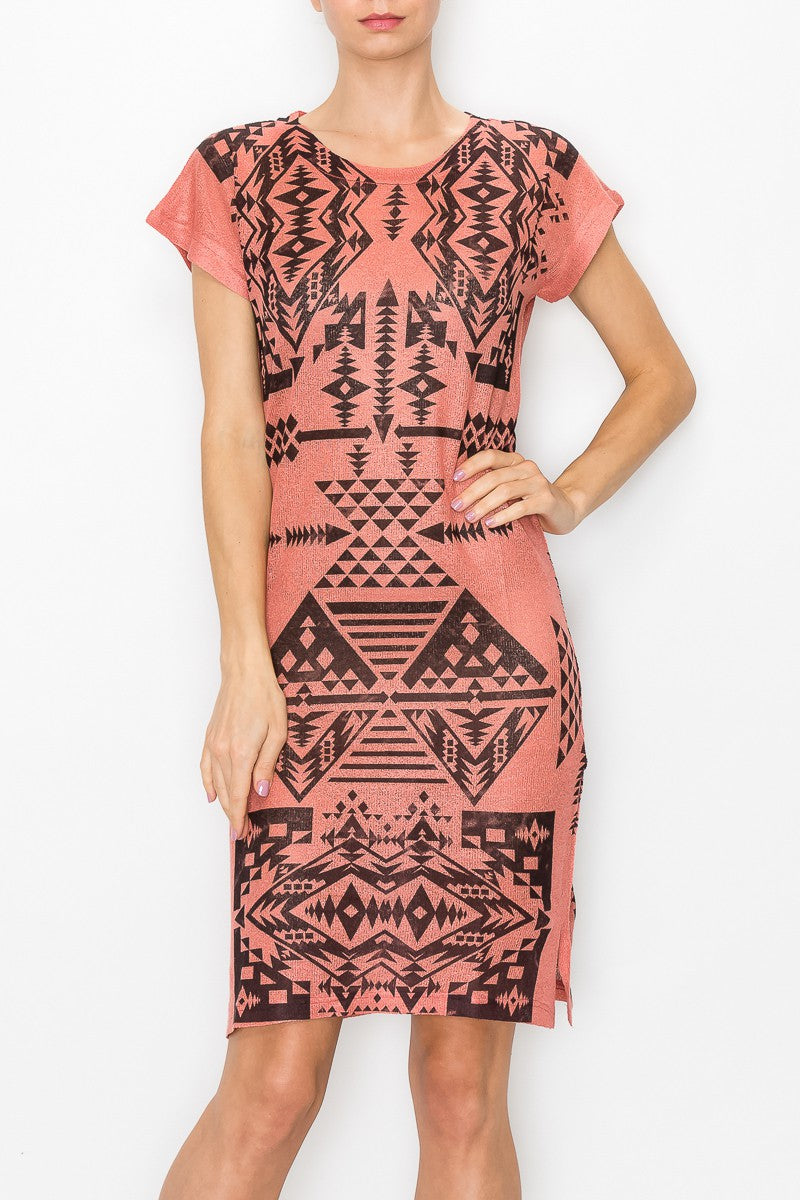 Short sleeve Aztec print dress by Yellow Hera in coral, featuring vibrant geometric patterns and a relaxed fit.