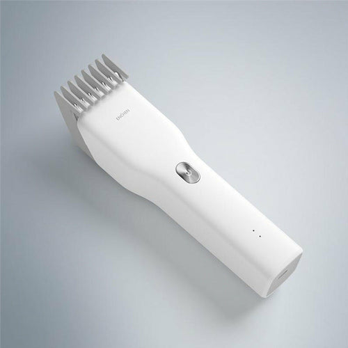 Maroon Asteria cordless hair clipper for adults and children, compact hair shaver with ergonomic design for easy use.