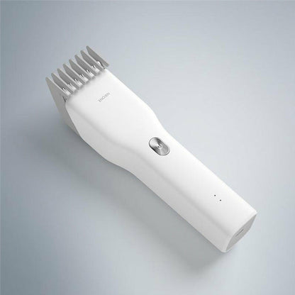Maroon Asteria cordless hair clipper for adults and children, compact hair shaver with ergonomic design for easy use.