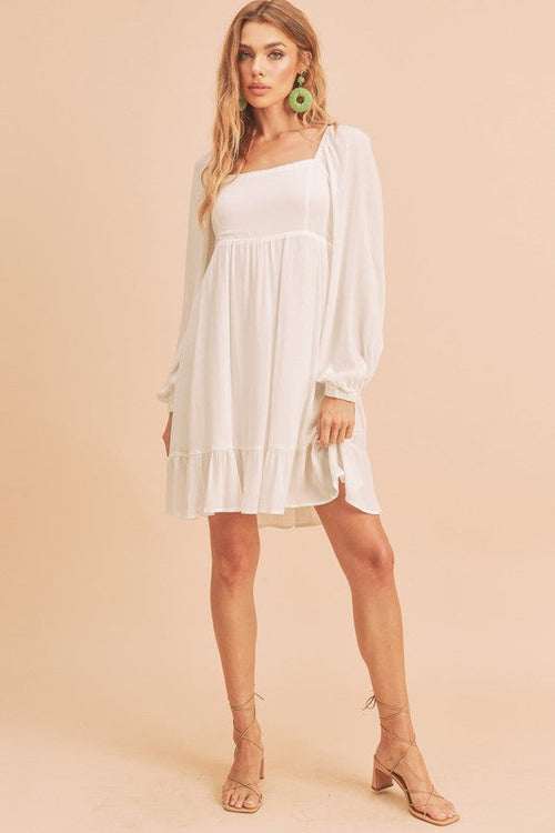 Jade Icarus Taya Dress for women, stylish casual dress with a flowing silhouette and vibrant pattern, perfect for everyday wear.