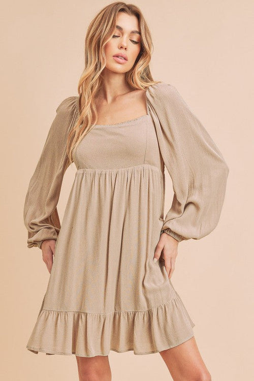 Jade Icarus Taya dress for women, stylish and flowy, with a fitted bodice and a flared skirt, perfect for casual or semi-formal wear.