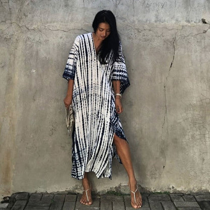 Jade Icarus Gio Wide Dress and Beach Cover Up featuring flowy fabric and a relaxed fit, perfect for beach or casual wear.