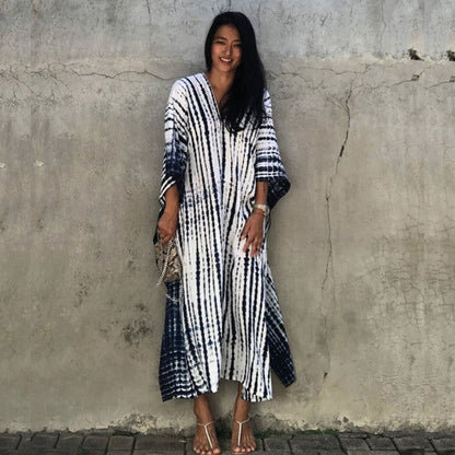 Jade Icarus Gio Wide Dress and Beach Cover Up, lightweight fabric with wide sleeves, perfect for summer beachwear.