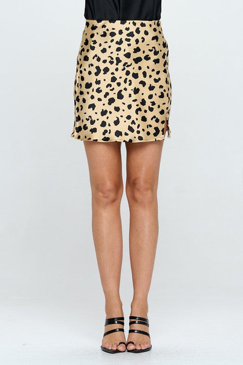 Leopard print satin mini skirt with slit from Jade Icarus, featuring a fashionable fit and stylish slit detail.