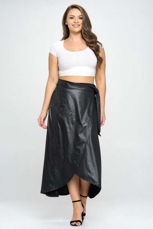 Faux leather maxi wrap skirt by Jade Icarus, showcasing a sleek, stylish design with a wrap-around style and smooth leather texture.