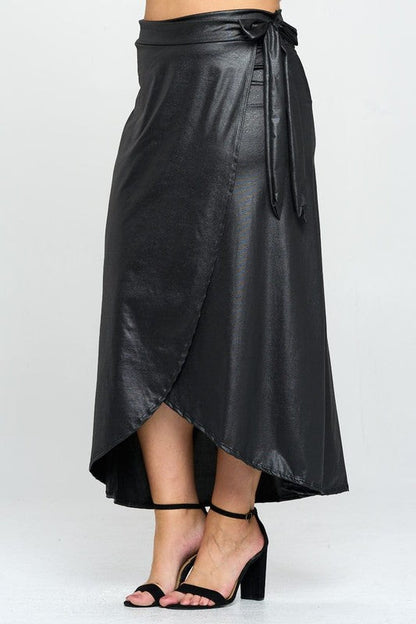 Automotive faux leather maxi wrap skirt by Jade Icarus featuring sleek design and detailed stitching, displayed on a neutral background.