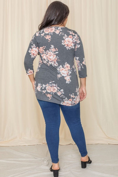 Plus floral curved hem tunic by Jade Icarus, featuring a flowy silhouette and vibrant floral pattern for women&