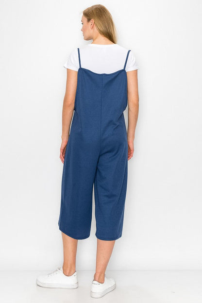 Blue oversized jumpsuit with cropped wide-leg bottoms from Yellow Hera, featuring a relaxed fit and stylish design.