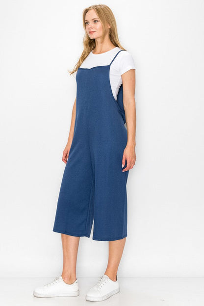 Blue oversized jumpsuit with wide-leg cropped bottoms from Yellow Hera, stylish dress for casual or chic occasions.