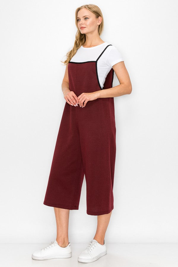 Burgundy oversized jumpsuit with cropped wide-leg pants by Yellow Hera, featuring a relaxed fit and stylish design.