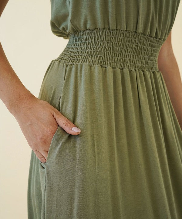Knee-length bamboo tube dress for women by Jade Icarus, featuring a fitted silhouette and natural bamboo fabric.