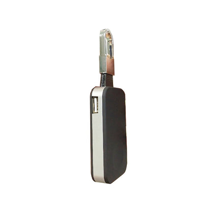 Salmon Lucky Apple Watch wireless charger power bank on key chain, portable tech accessory with compact design and built-in charging features.