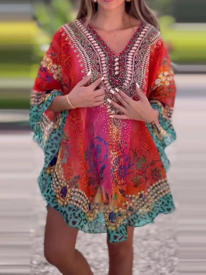 Floral print V-neck cover-up by Carmine Juneberry, lightweight and stylish gift for beach or poolside wear.