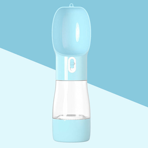 Teal Winterberry portable pet food and water bottle for pets, with a compact design and built-in bowl for on-the-go feeding.