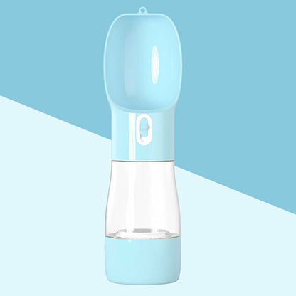 Teal Winterberry portable pet food and water bottle for pets, with a compact design and built-in bowl for on-the-go feeding.