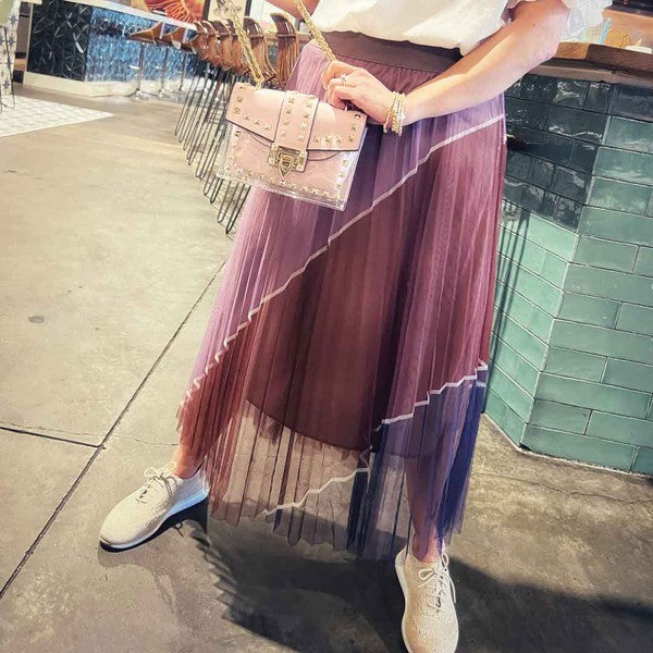 Double-layered Amelia skirt by Jade Icarus, featuring automotive-inspired design and intricate fabric details.