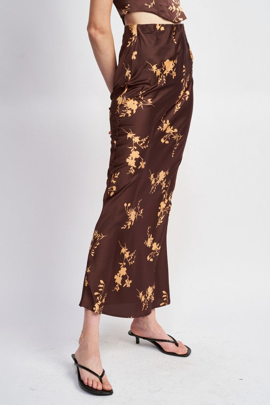 Automotive image showing a high waist bias cut maxi skirt by Jade Icarus with a sleek, flowing design and elegant fabric.