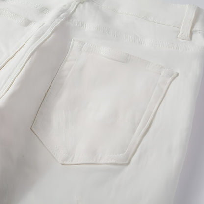 Carmine Juneberry DenimDare™ street ripped stretch slim jeans for women, showcasing distressed denim and slim fit design.