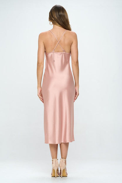 Jade Icarus satin bias slip dress with a side slit, sleeveless design, smooth fabric, and elegant fit for women&