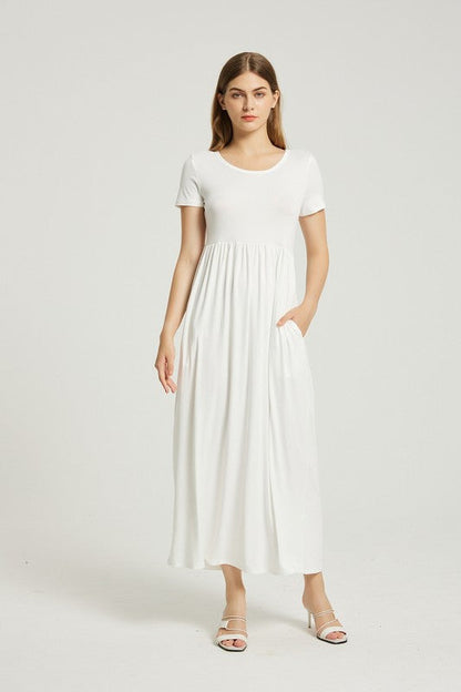 Women’s casual summer maxi dress with pockets by Jade Icarus, featuring a flowy design and sleeveless style.