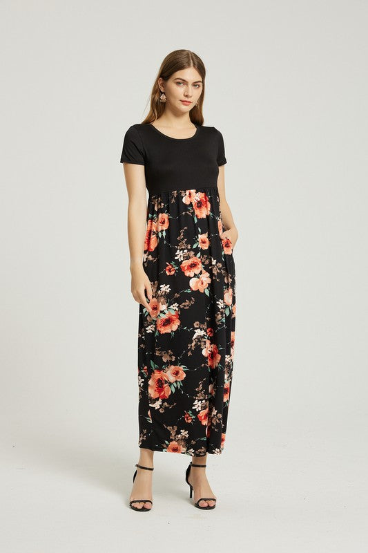 Women’s casual floral maxi dress with pockets by Jade Icarus, featuring a summer-friendly design and vibrant floral pattern.