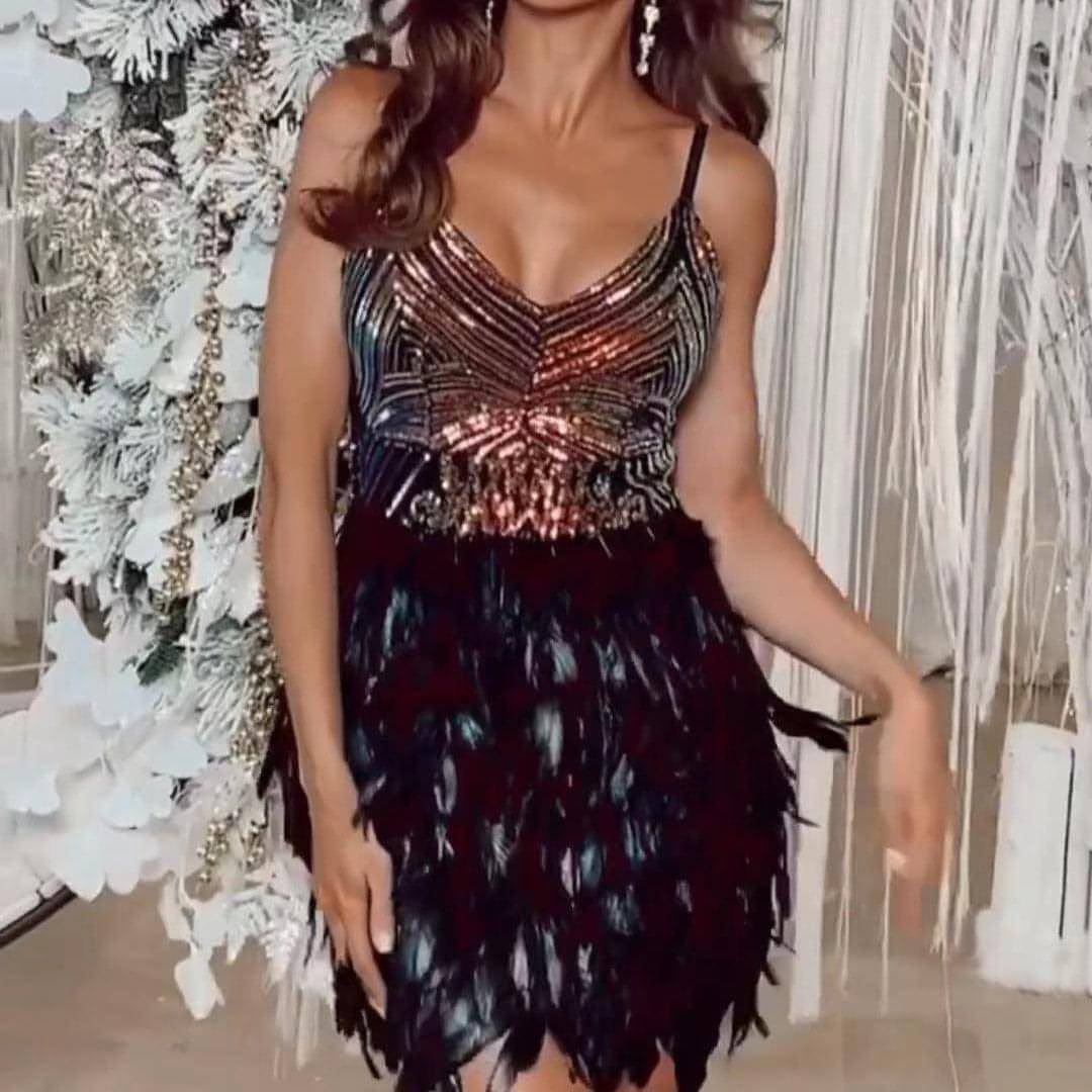Carmine Juneberry sleeveless sequins dress with suspenders and tight fit, styled as a fashionable skirt.