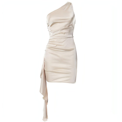 Carmine Juneberry sleeveless slim fit crossbody dress hanging on a display with a modern background