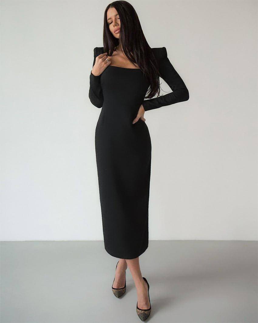 Carmine Juneberry long skirt with square neckline and slim fit, showcasing elegant design and smooth fabric.