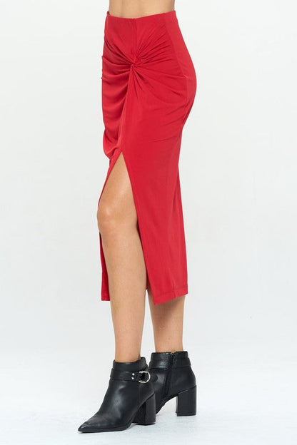 Made in USA Jade Icarus midi skirt with front knot and slit, showcasing a flowy fabric and stylish design.