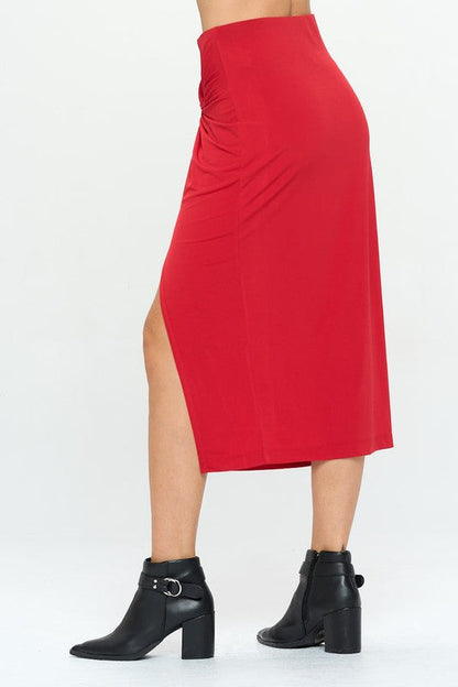Made in USA midi skirt by Jade Icarus featuring front knot, side slit, and flowy fabric.