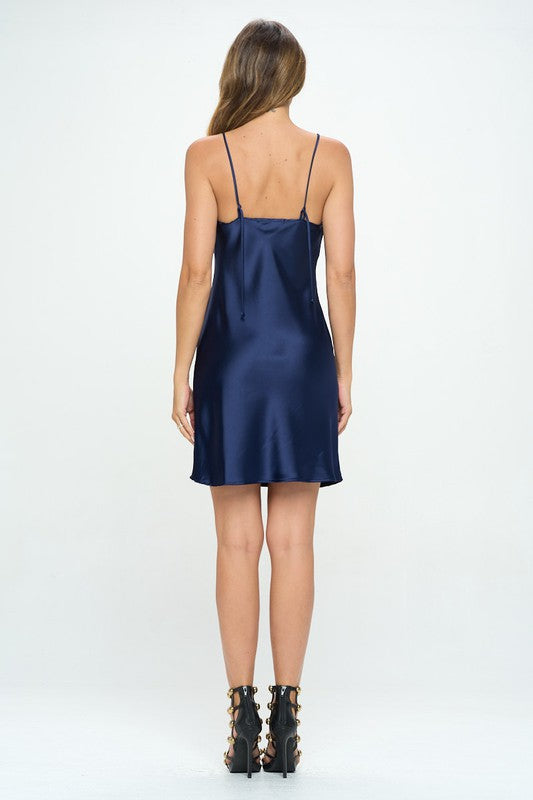 Solid heavy bias cut satin slip dress for women by Jade Icarus, showcasing smooth fabric and elegant silhouette.