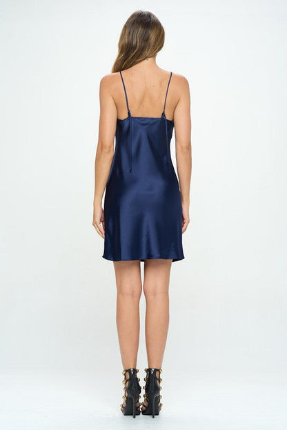 Solid heavy bias cut satin slip dress for women by Jade Icarus, showcasing smooth fabric and elegant silhouette.