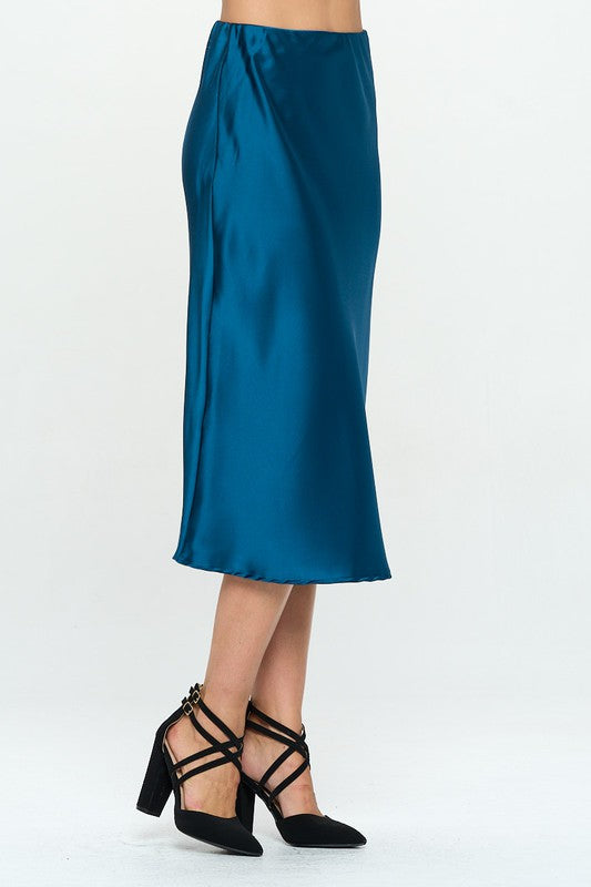 Made in USA Jade Icarus solid satin midi skirt with a smooth, flowing fabric and elegant design, displayed on a model.