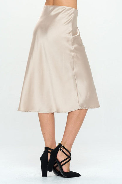 Made in USA Jade Icarus solid satin midi skirt, showcasing smooth fabric and stylish length on a mannequin.