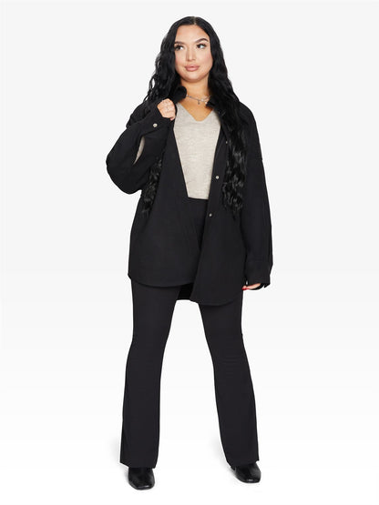 Rose Eleusis oversized patch pocket shacket featuring a relaxed fit, button-front closure, and utility-style patch pockets.