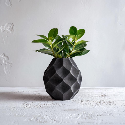 Geometric 3D printed vase with dried flowers, modern faceted home planter by Start2Finish showcasing a contemporary design