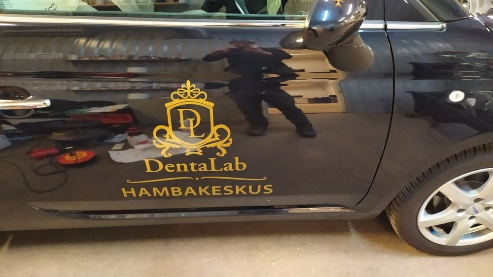 Custom vinyl car decal from Start2Finish, personalized auto sticker with business design, lettering, and name for truck doors and windows.