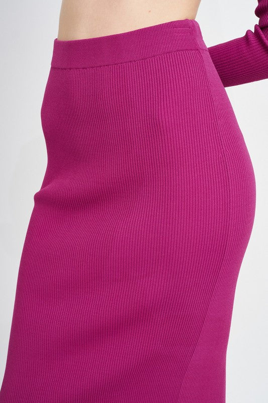 Jade Icarus high waist midi pencil skirt in black, close-up view showing fitted silhouette and smooth fabric.